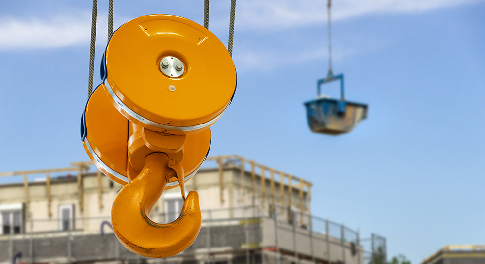 Low angle view of yellow hoist